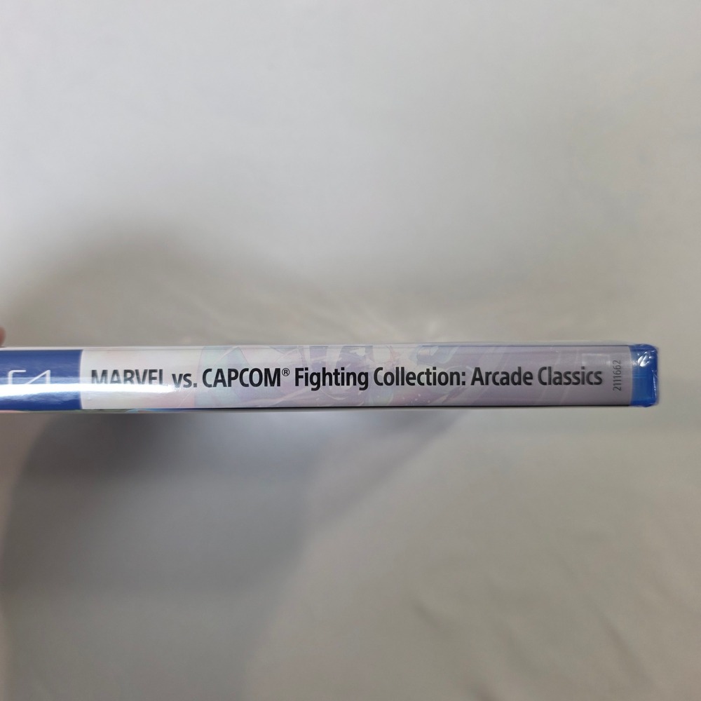 Capcom Marvel vs Capcom Fighting Collection PS4 New Sealed Comic Included - Picture 3 of 3